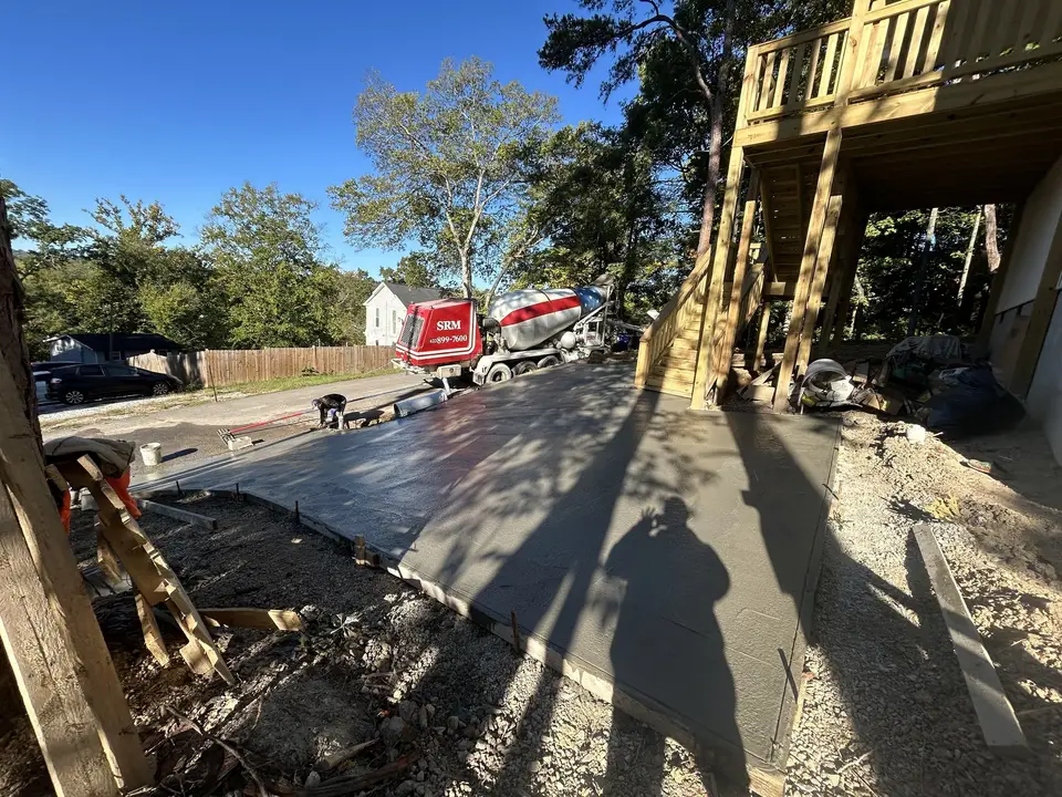 In progress photo 4: Hillside lot grading and concrete driveway